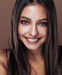 Image showing cute happy young indian woman in studio close up happy smiling, fashion mulatto adorable smile, lifestyle people concept