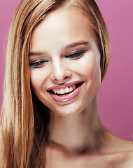 Image showing young pretty blonde woman with hairstyle close up and makeup on 