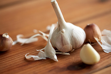 Image showing close up of garlic on wooden table