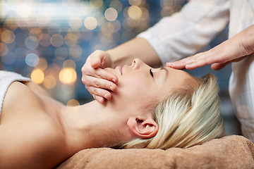 Image showing close up of woman having face massage in spa