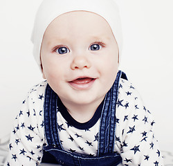 Image showing little cute baby toddler on carpet isolated close up smiling, lifestyle people concept