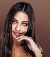 Image showing cute happy young indian woman in studio close up happy smiling, fashion mulatto adorable smile, lifestyle people concept