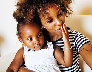 Image showing adorable sweet young afro-american mother with cute little daugh