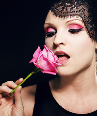 Image showing portrait of beauty young woman through lace close up mistery makeup