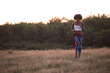 Image showing young black woman in nature