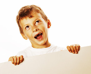 Image showing little cute boy holding empty shit to copyspace isolated close u