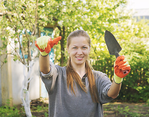 Image showing young woman gardener