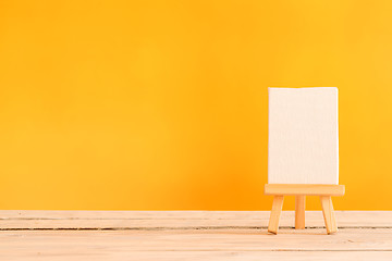 Image showing Canvas on a wooden table