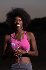 Image showing african american woman jogging in nature