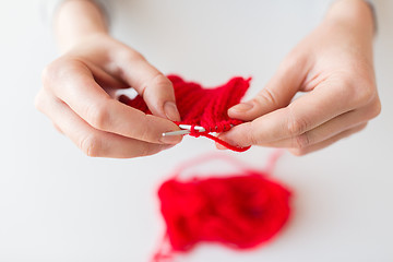 Image showing woman hands knitting with needles and yarn