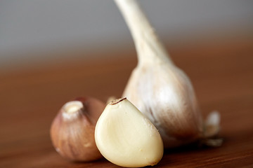 Image showing close up of garlic on wooden table