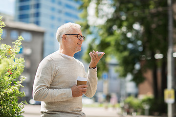 Image showing old man using voice command recorder on smartphone