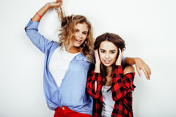 Image showing two best friends teenage girls together having fun, posing emotional on white background, besties happy smiling, making selfie, lifestyle people concept