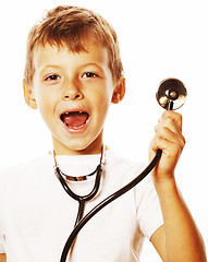 Image showing little cute boy with stethoscope playing like adult profession d