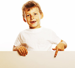 Image showing little cute boy holding empty shit to copyspace isolated close u