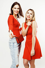 Image showing best friends teenage girls together having fun, posing emotional on white background, besties happy smiling, lifestyle people concept