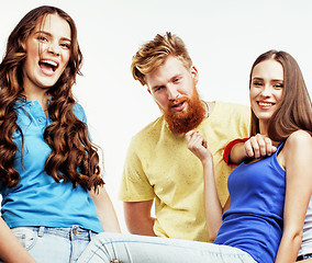 Image showing company of hipster guys, bearded red hair boy and girls students having fun together friends, diverse fashion style, lifestyle people concept isolated on white background