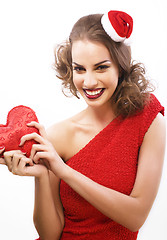 Image showing young pretty happy smiling brunette woman on christmas in santas