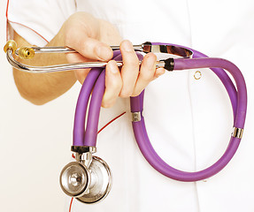 Image showing Close-up of female doctor using stethoscope