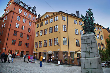 Image showing STOCKHOLM, SWEDEN - AUGUST 19, 2016: Tourists walk and Statue of