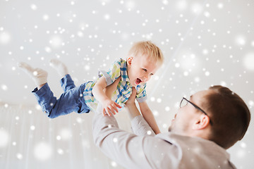 Image showing father with son playing and having fun at home