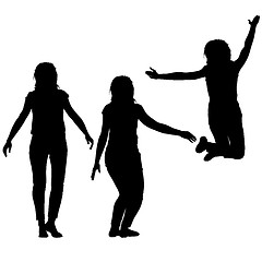 Image showing Silhouette of three young girls jumping with hands up, motion. illustration