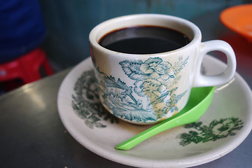 Image showing Steaming traditional oriental Chinese style dark coffee