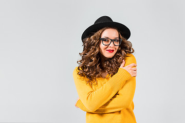 Image showing The girl in glasses and hat