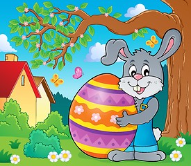 Image showing Bunny holding big Easter egg theme 3