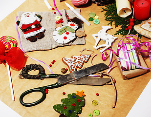 Image showing lot of stuff for handmade gifts, scissors, ribbon, paper with co