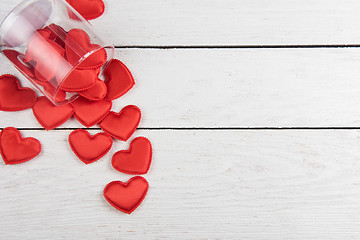 Image showing Red hearts on a white wood background