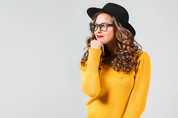 Image showing The girl in glasses and hat