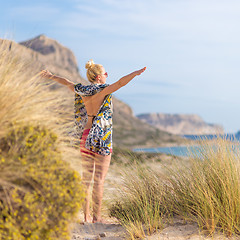 Image showing Free Happy Woman Enjoying Sun on Vacations.