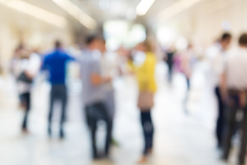 Image showing Abstract blurred people socializing during coffee break at business conference.