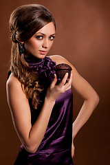 Image showing Young Beauriful Woman With Muffin