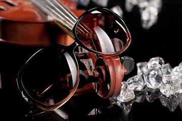 Image showing Sunglasses, Violin, Ice And Sunglasses