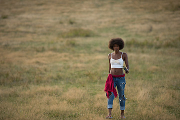 Image showing young black woman in nature