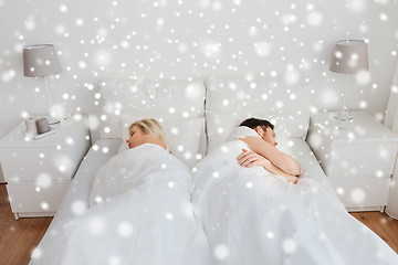 Image showing couple sleeping in bed at home