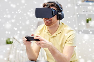 Image showing man in virtual reality headset with controller