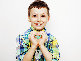 Image showing young pretty little boy kid wondering, posing emotional face isolated on white background, gesture happy smiling close up, lifestyle people concept