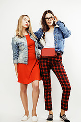 Image showing best friends teenage girls together having fun, posing emotional on white background, besties happy smiling, lifestyle people concept