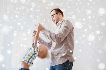 Image showing father with son playing and having fun at home