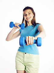 Image showing young pretty slim woman with dumbbell isolated cheerful smiling, real sport girl next door, lifestyle people concept