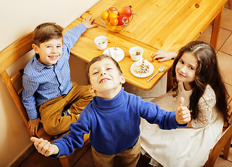 Image showing little cute boys eating dessert on wooden kitchen. home interior. smiling adorable friendship together forever friends, lifestyle people concept