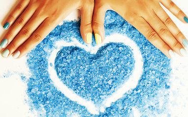 Image showing manicure with blue nails and seasalt