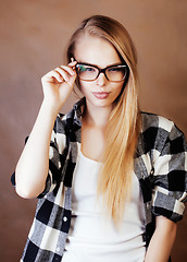 Image showing young happy smiling hipster blond girl with backpack ready to sc