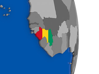 Image showing Guinea on globe with flag