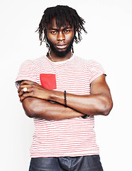 Image showing young handsome african american boy singing emotional with microphone isolated on white background, in motion gesturing smiling, lifestyle people concept