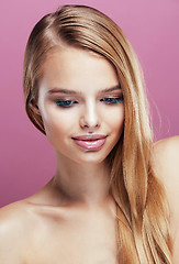 Image showing young pretty blonde woman with hairstyle close up and makeup on 