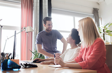 Image showing happy creative team in office